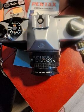 Pentax Silver and Black Film SLR Camera with Black Lens